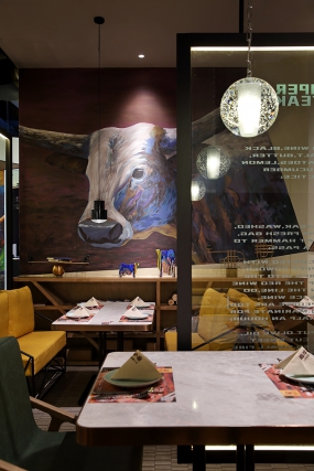 牛排餐廳裝飾布局圖,牛排餐廳空間設(shè)計(jì)效果圖