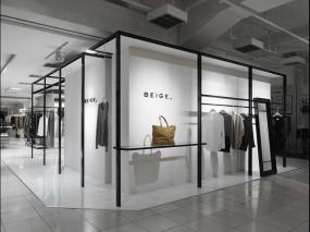 女服裝店室內(nèi)掛衣架裝修效果圖片